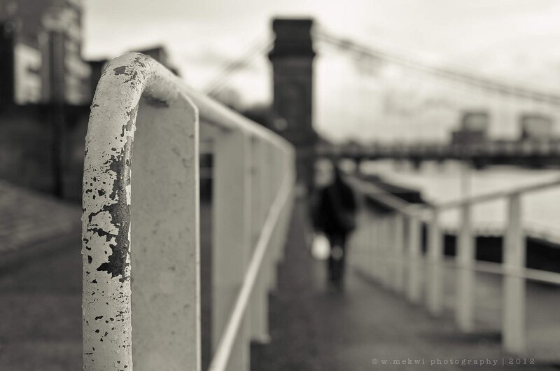 Weathered railing on a bridge