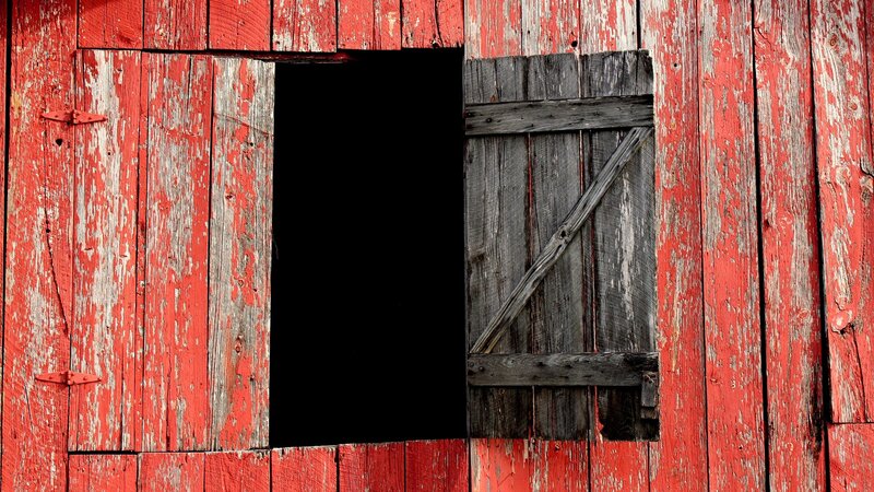 weathered red barn door