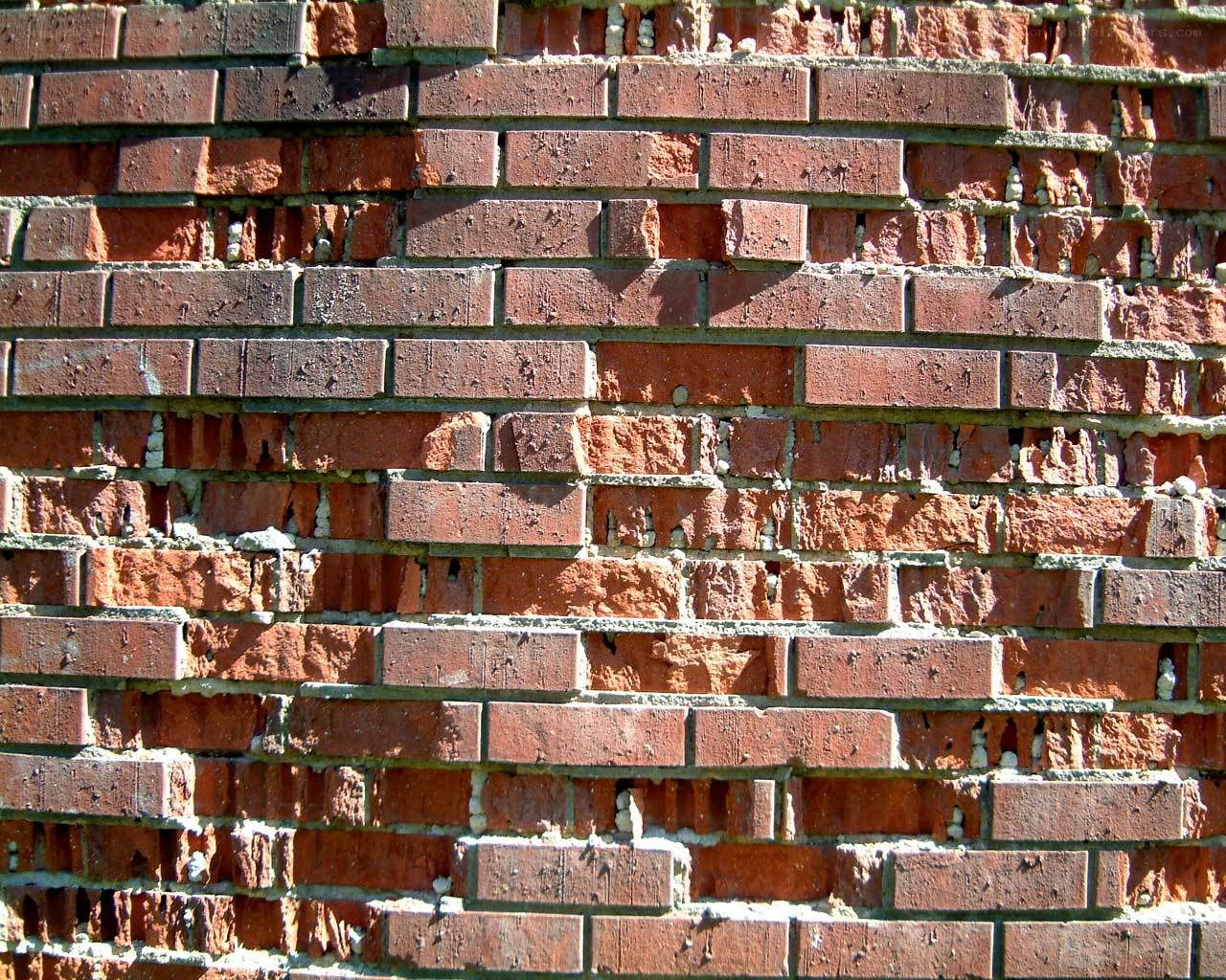 weathered red brick wall