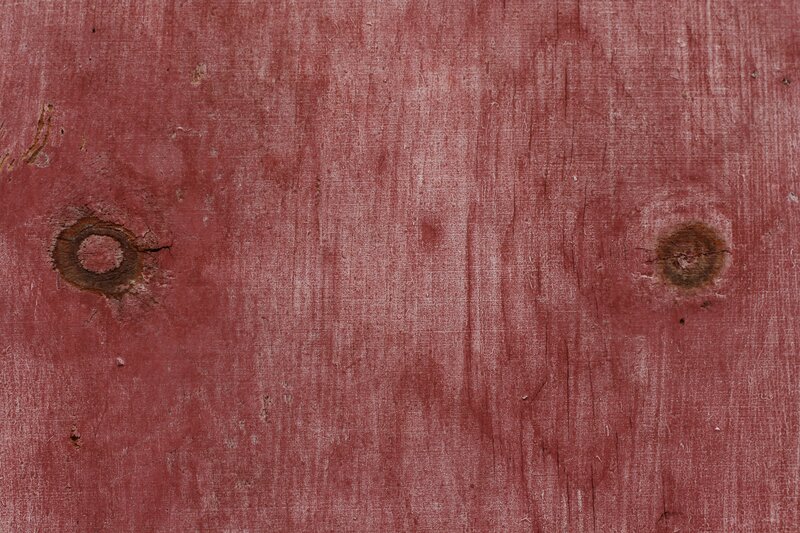 weathered red wooden surface