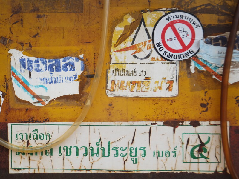Weathered Stickers on Metal