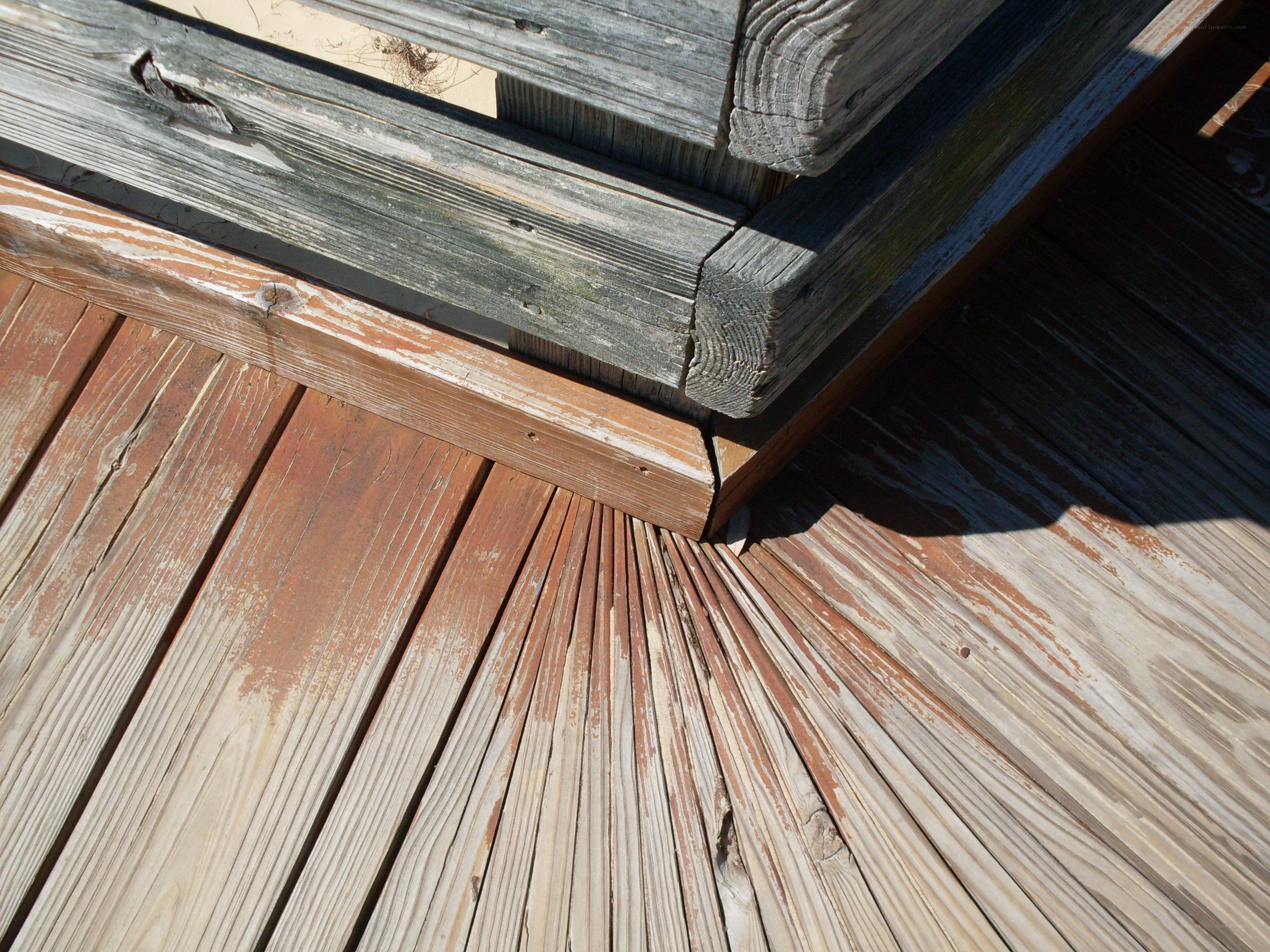 weathered wooden deck corner