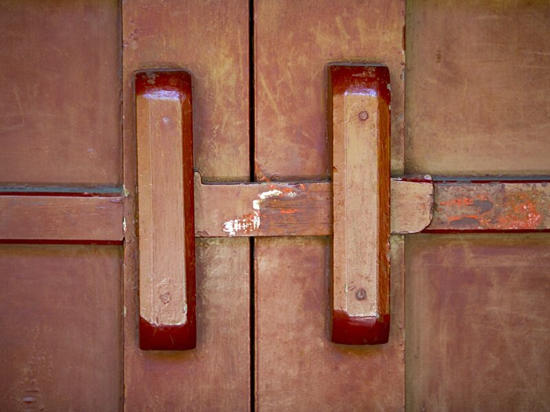 weathered wooden door handles