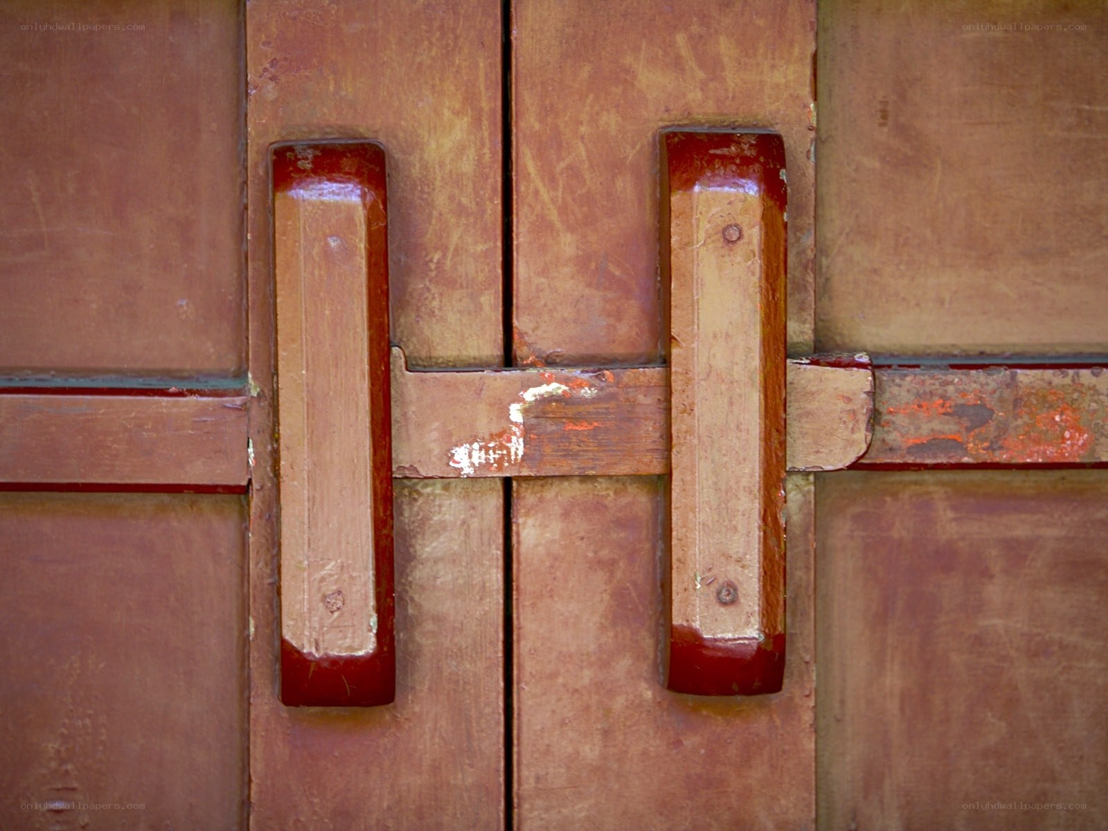 weathered wooden door handles