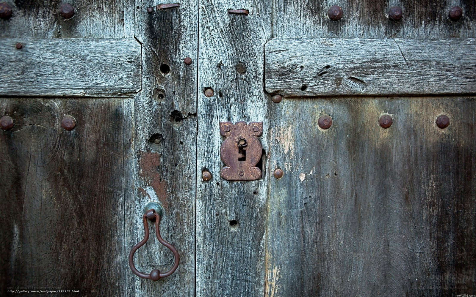 weathered wooden door with lock