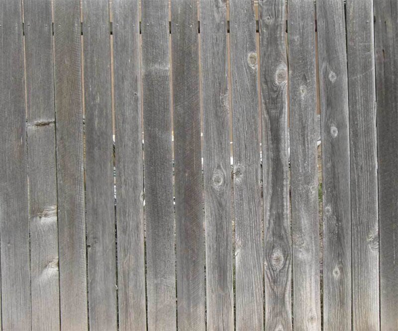 weathered wooden fence panels
