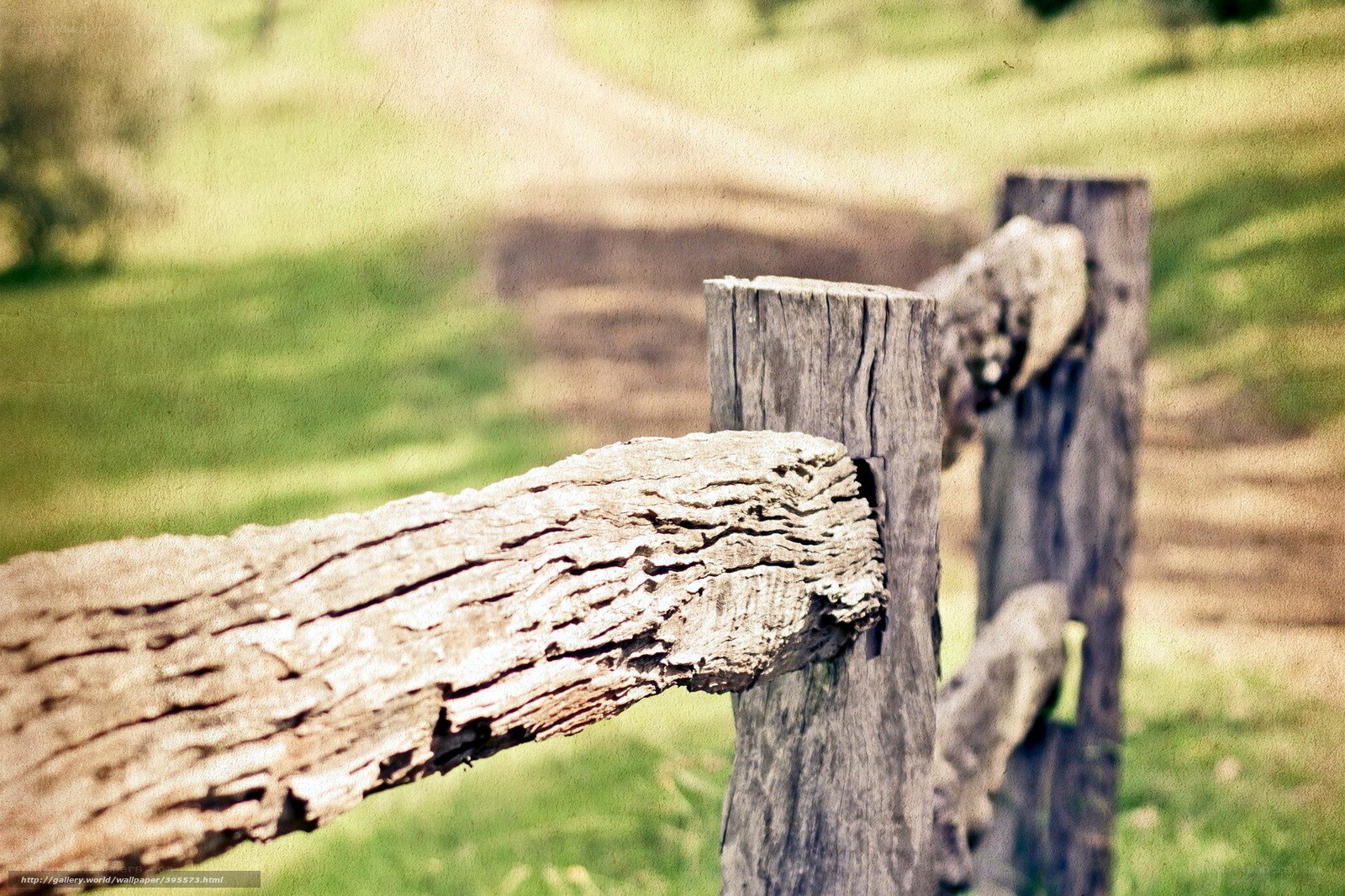 weathered wooden fence post