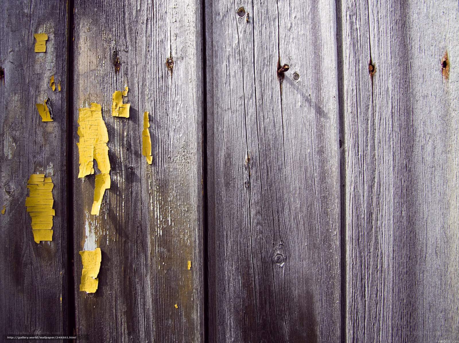 weathered wooden planks with peeling paint