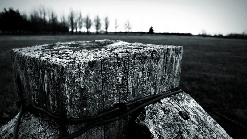 Weathered Wooden Post — Black