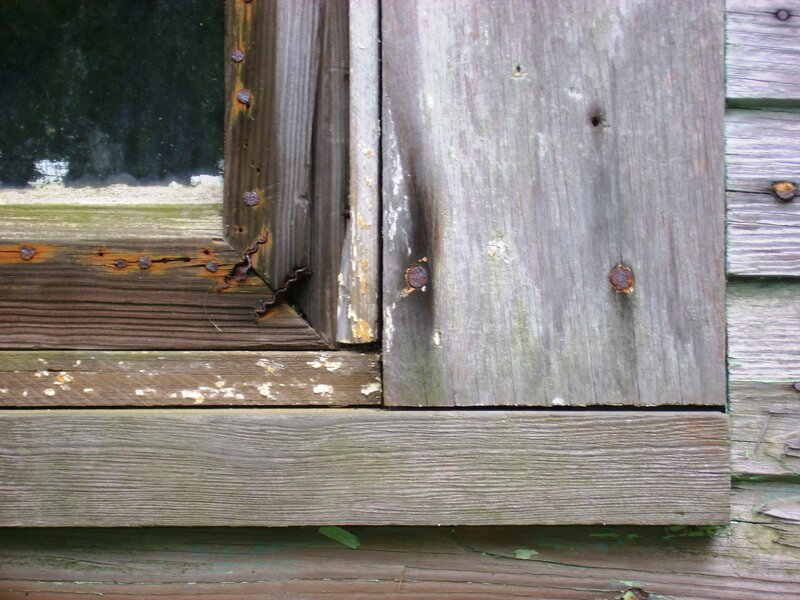 weathered wooden window frame