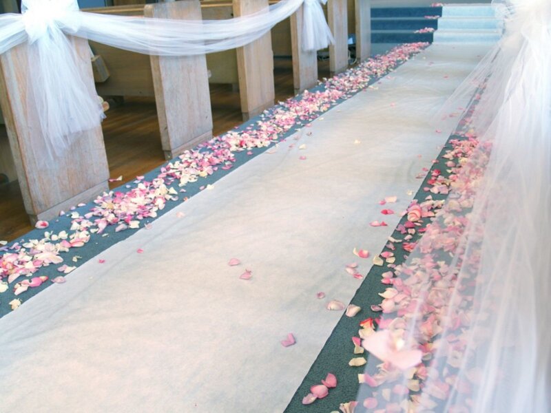 wedding aisle with rose petals