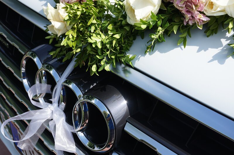 Wedding car with floral arrangement