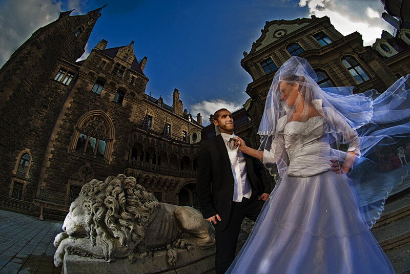 Wedding couple in front of castle