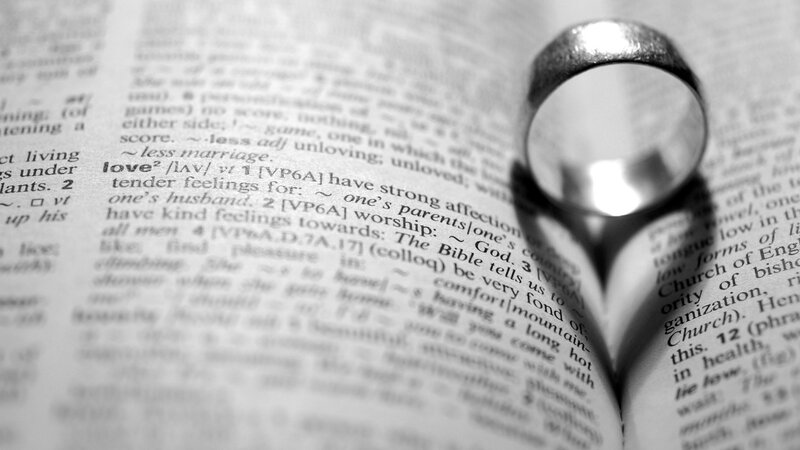 Wedding Ring on Book — Black