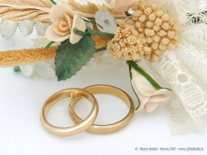 Wedding Rings and Bouquet — Gold