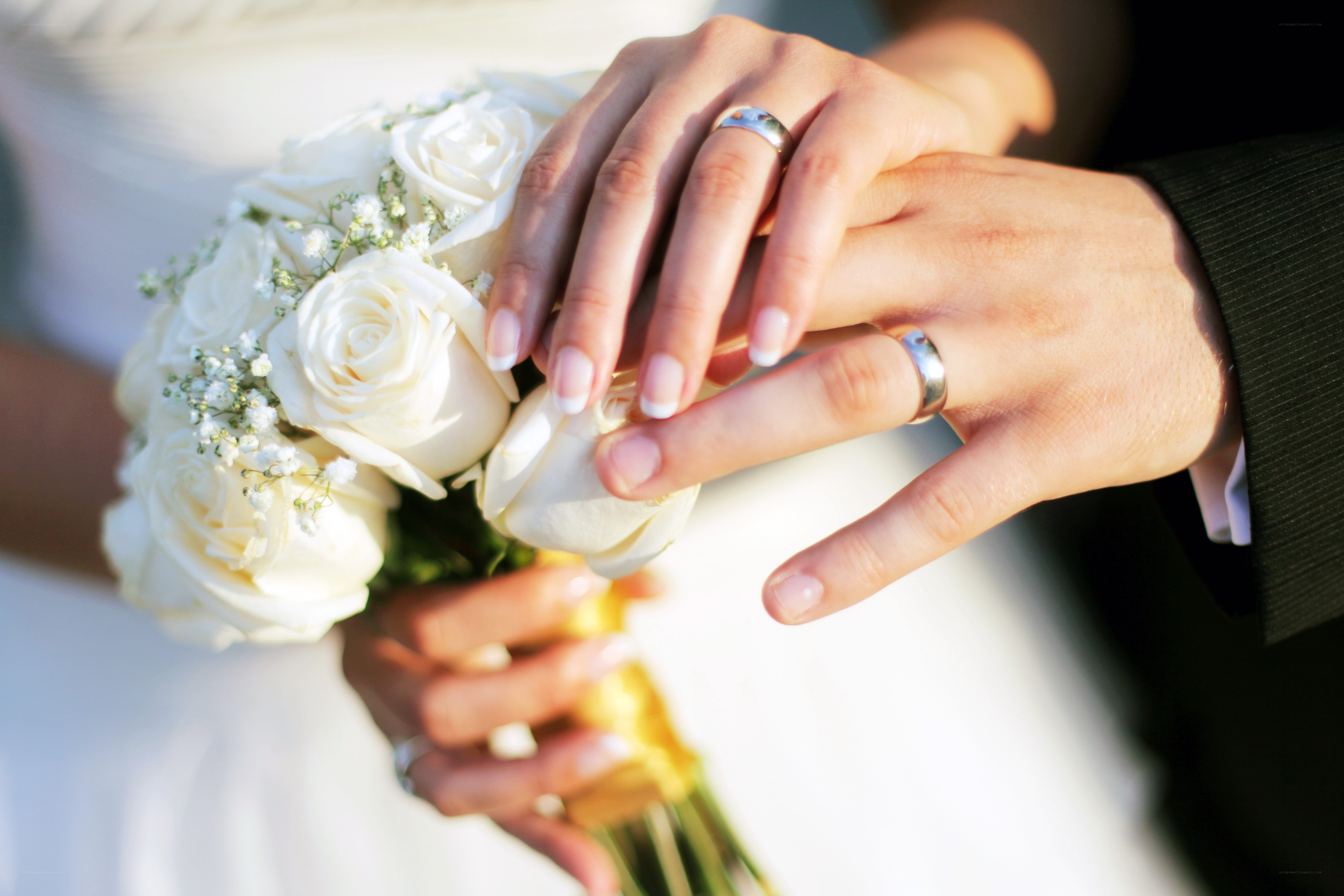 wedding rings and bouquet