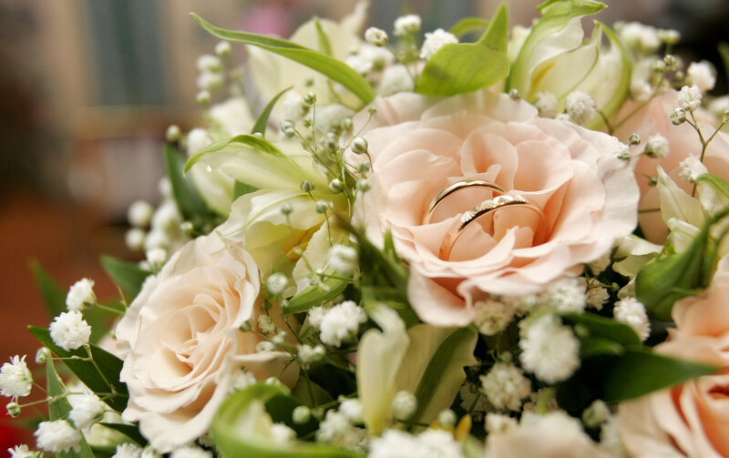 wedding rings in a flower bouquet