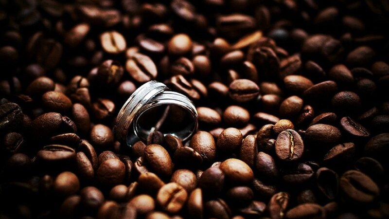 wedding rings on coffee beans