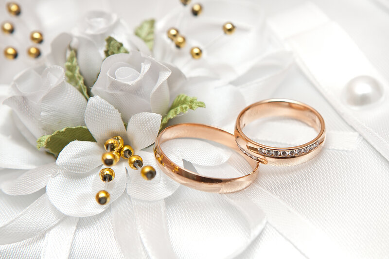 Wedding Rings on Flowers — White, Serene, Photograph