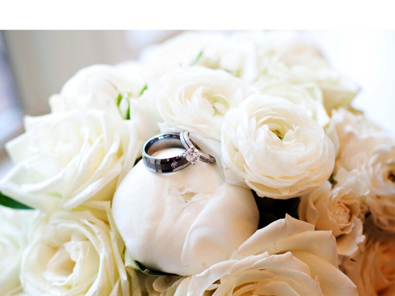 Wedding Rings on Flowers — White