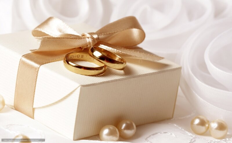 Wedding rings on gift box