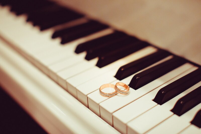 Wedding Rings on Piano — White