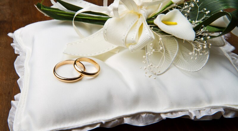 Wedding Rings on Pillow — White, Serene, Photograph, Flowers