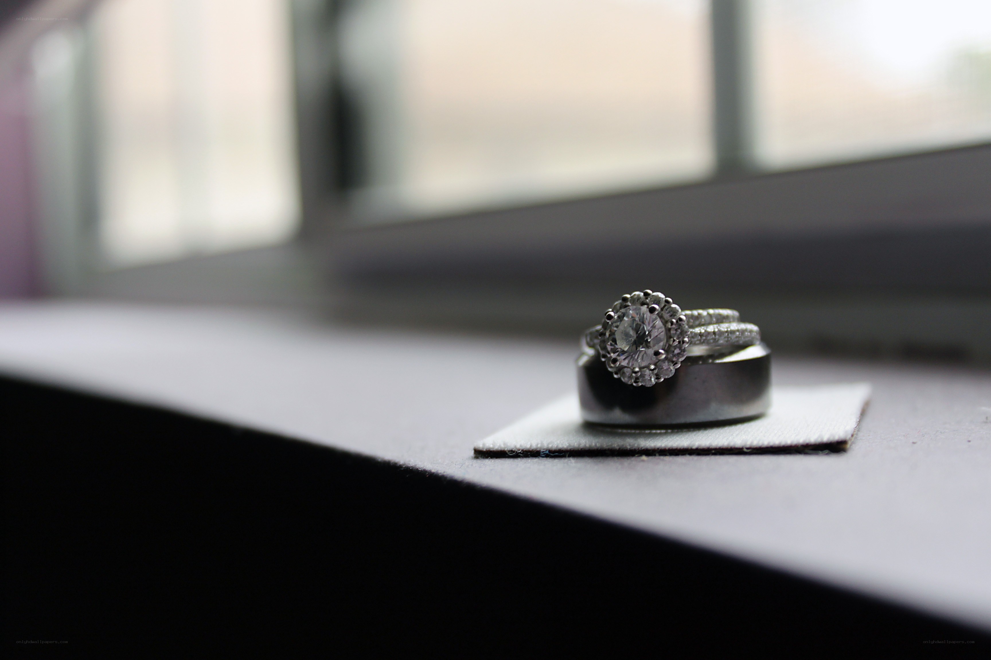 wedding rings on windowsill