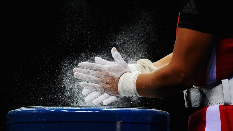 Weightlifter Applying Chalk