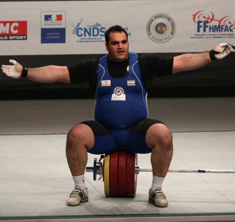 weightlifter celebrating lift