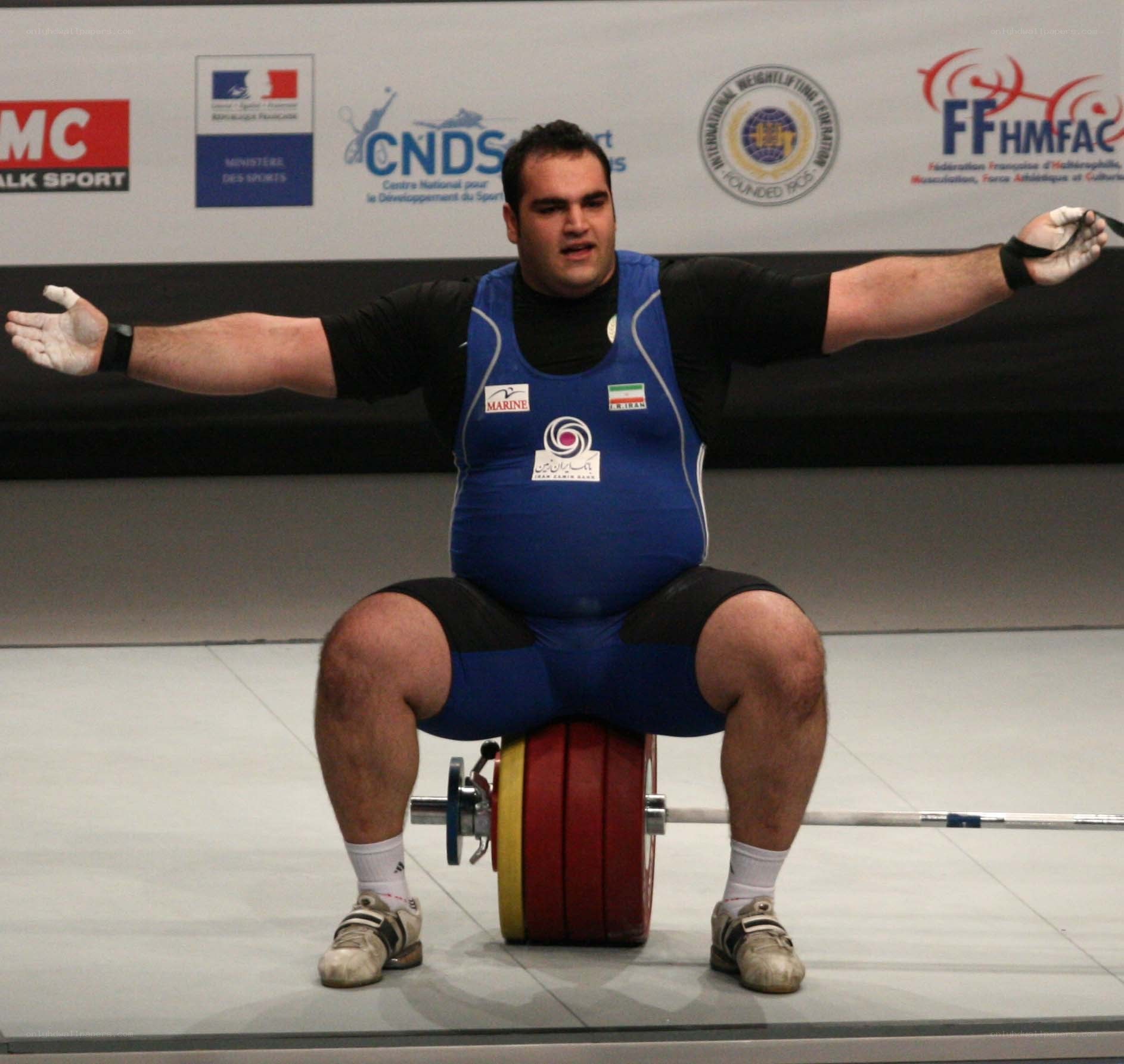 weightlifter celebrating lift