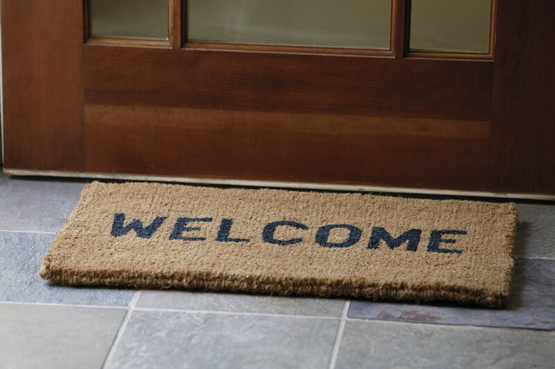 welcome mat by front door