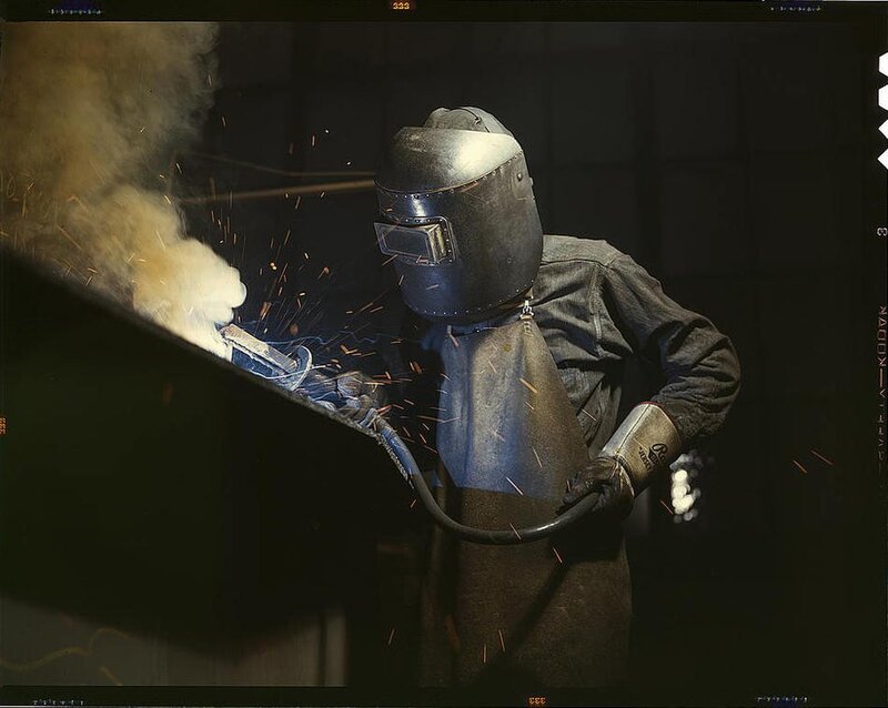 Welder working with sparks