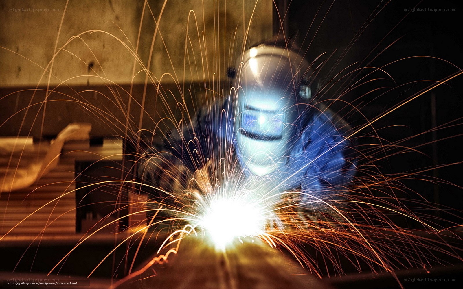 Welder working with sparks