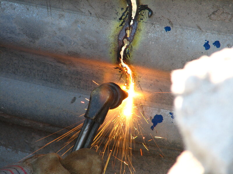 Welding metal with torch