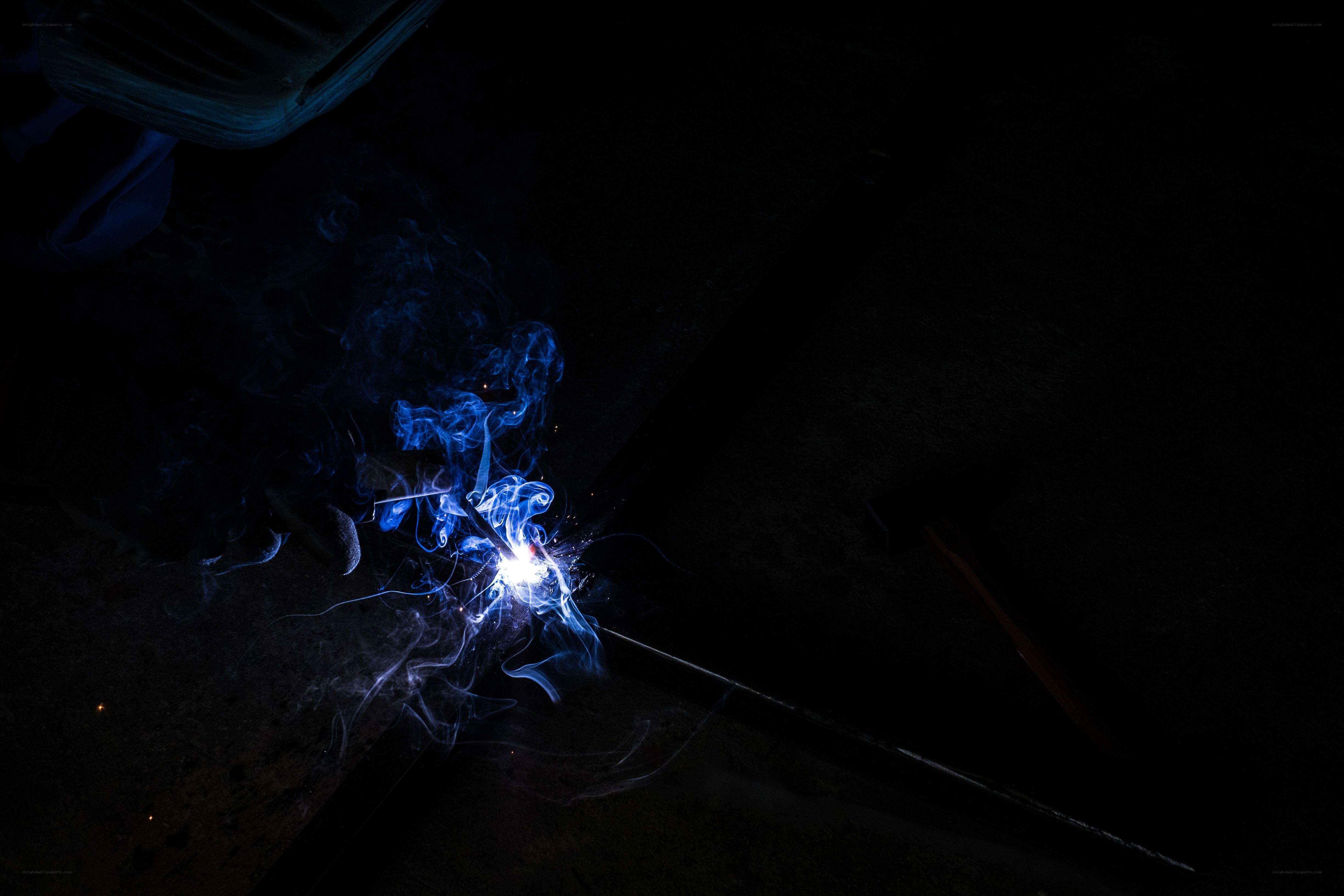 Welding sparks in darkness