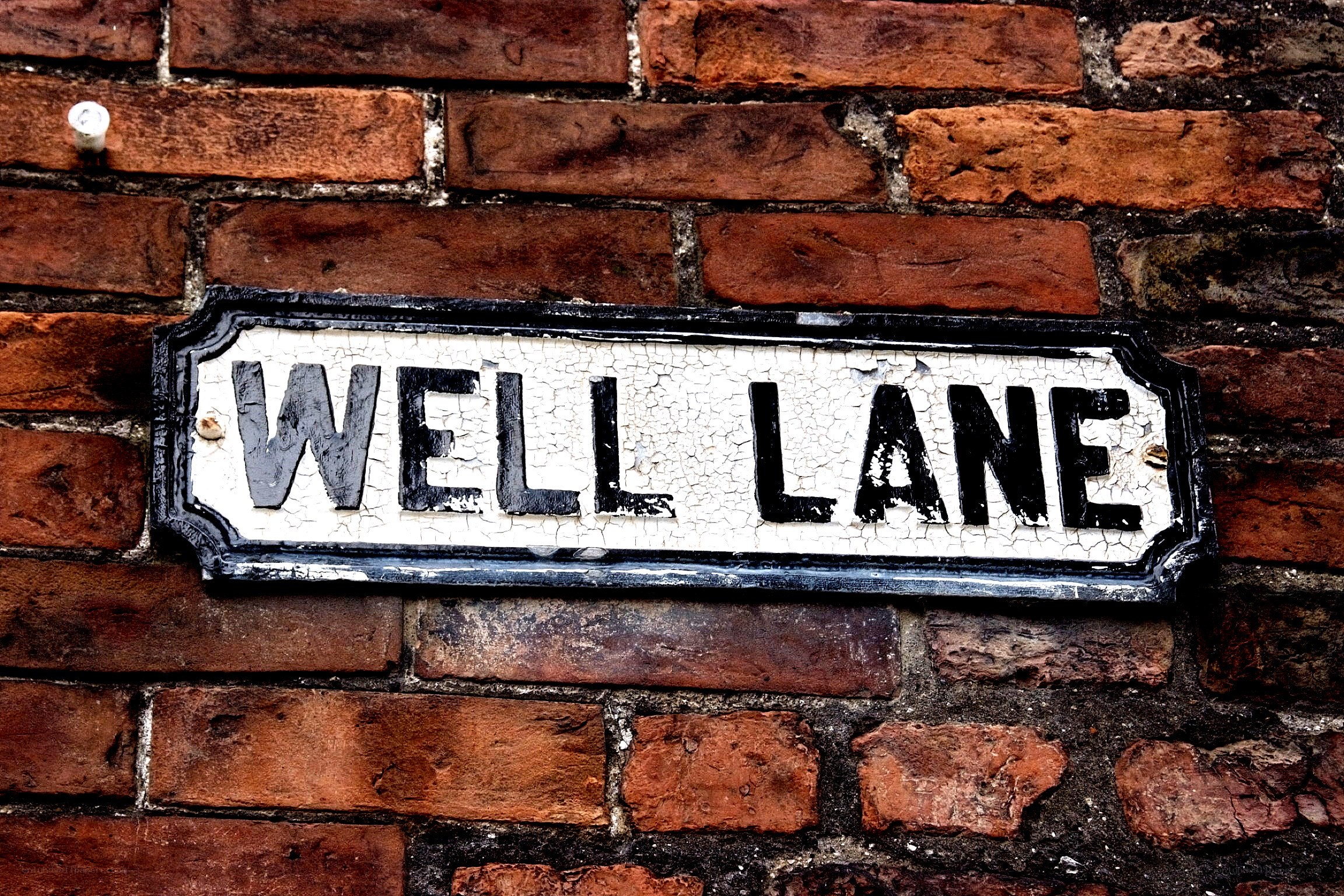 Well Lane street sign