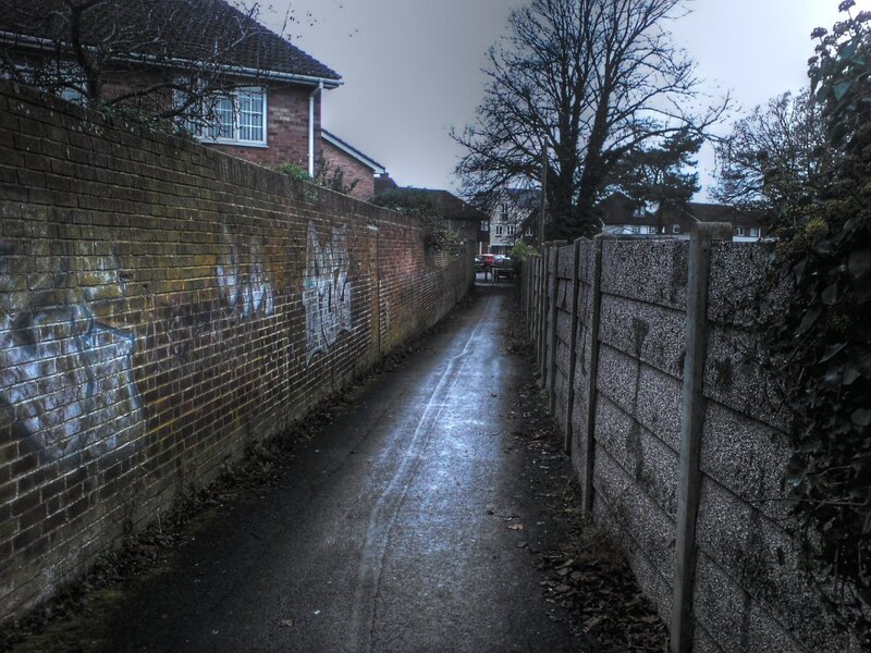 wet alleyway between houses