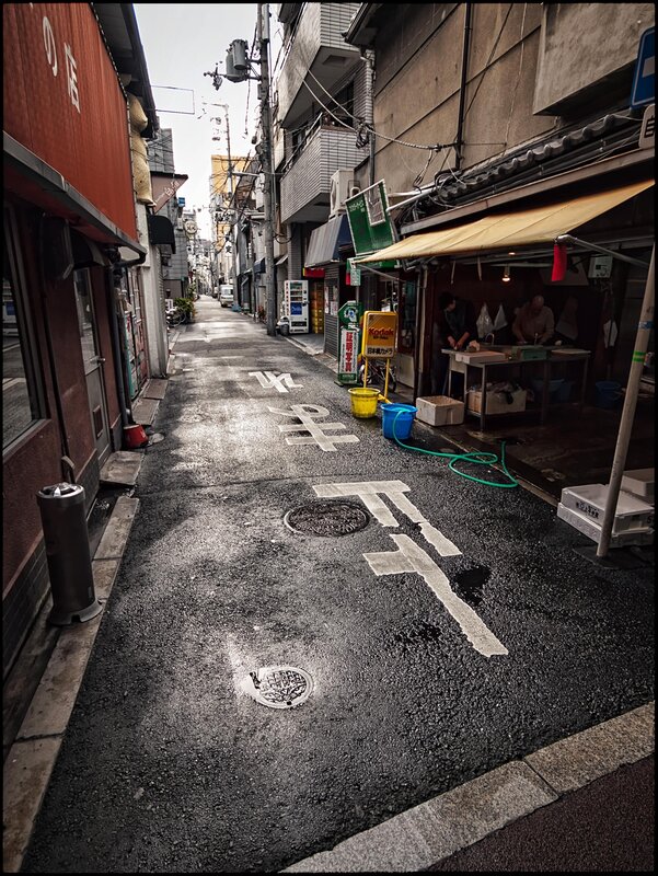 Wet Alleyway with Shops