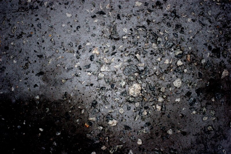 Wet Asphalt Surface — Gray