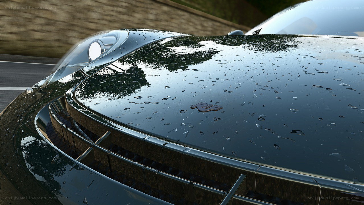 wet car hood with raindrops