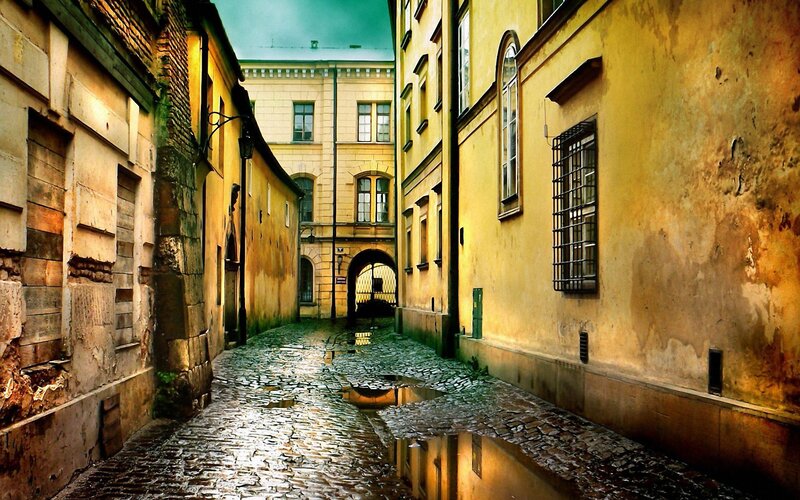 wet cobblestone alley in old town