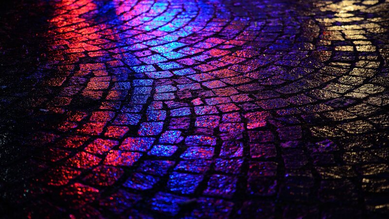 Wet Cobblestone Pavement — Red