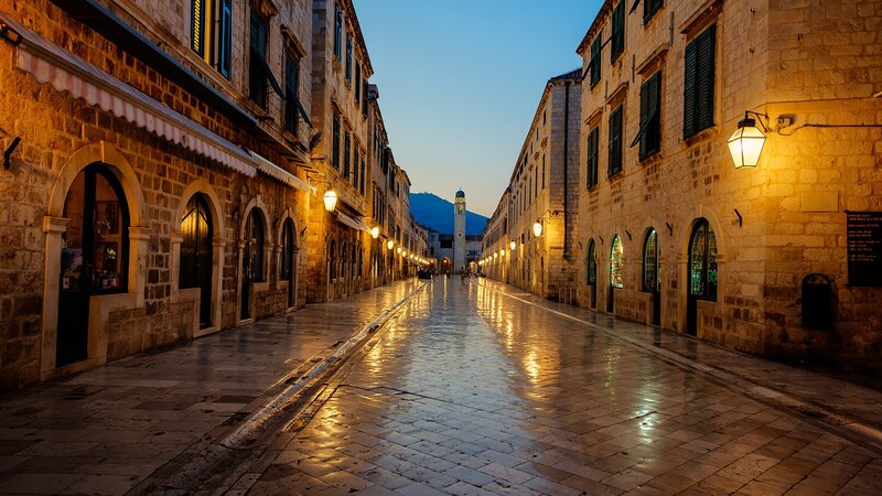 Wet Cobblestone Street — Yellow, Serene