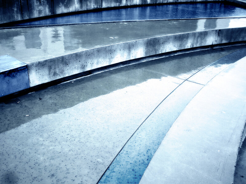 wet concrete steps and pool