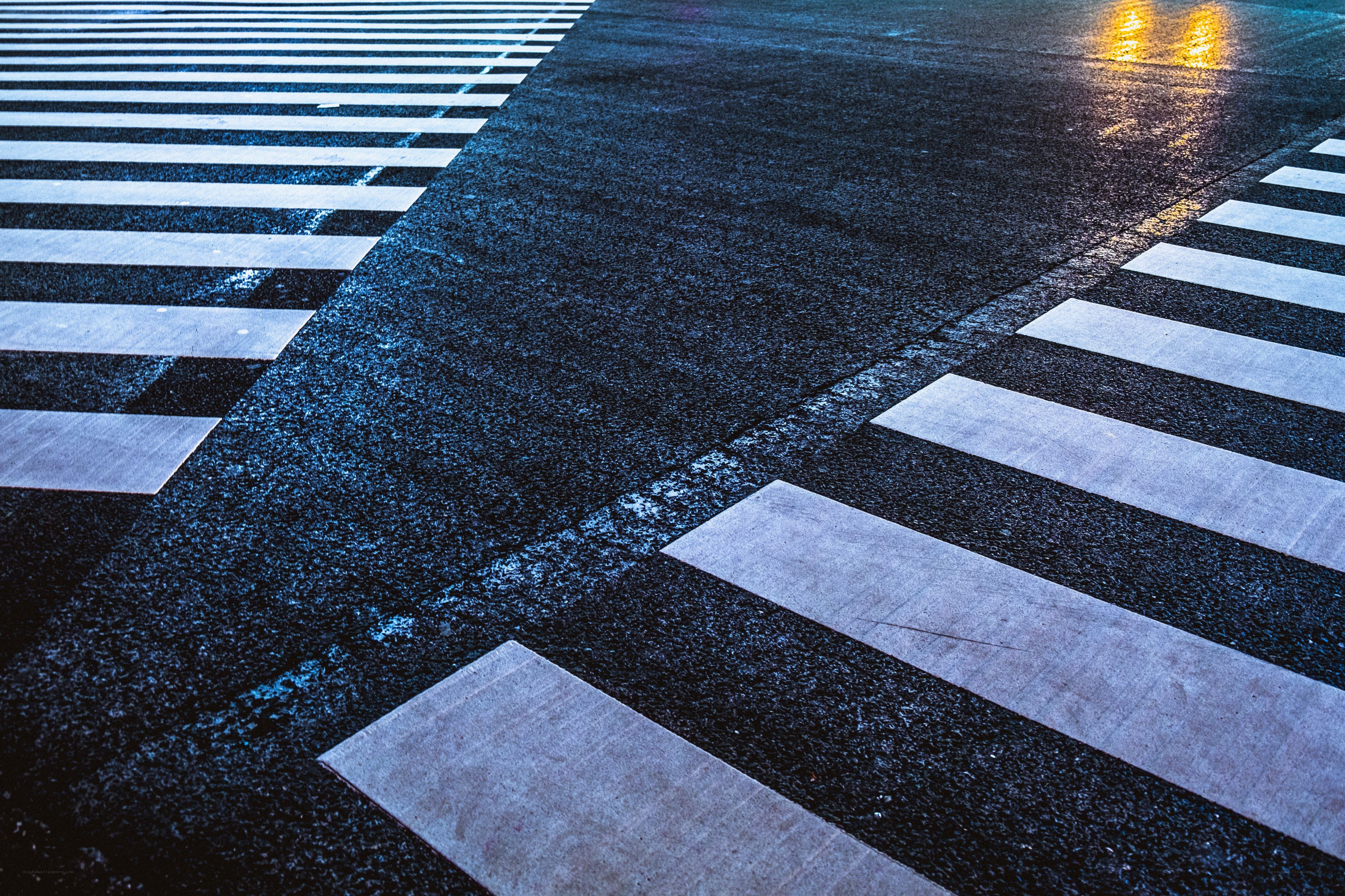 wet crosswalk at night