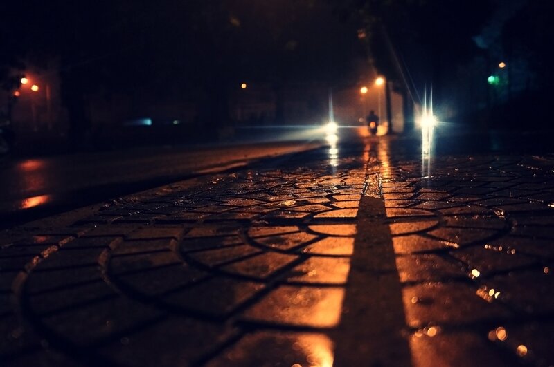Wet pavement at night