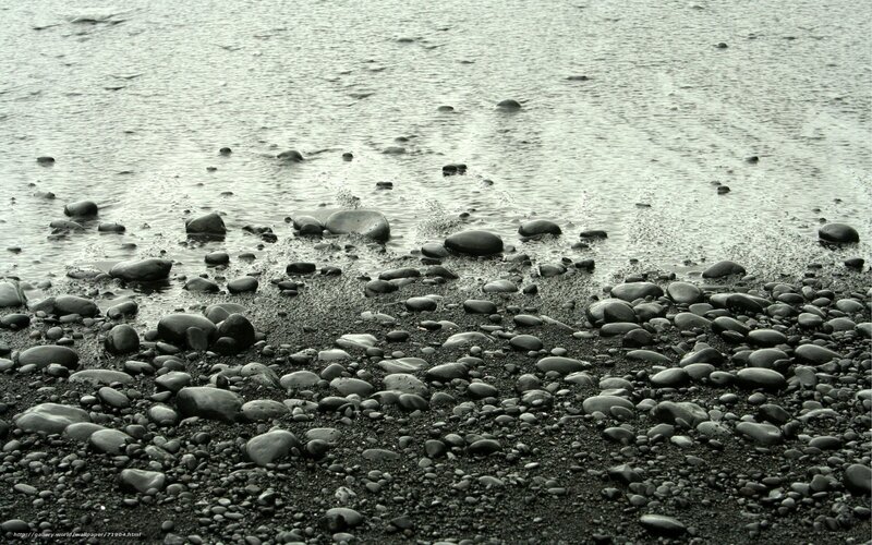 Wet pebbles on a beach
