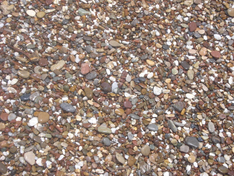Wet Pebbles on Beach