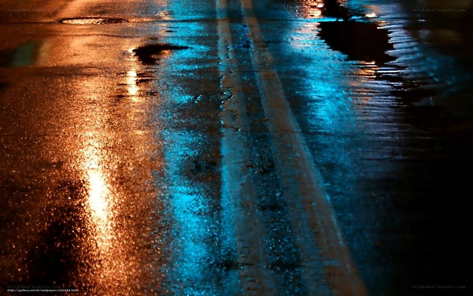 Wet road at night with reflections